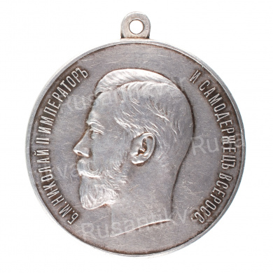Медаль "За Усердие" с портретом Императора Николая II (образца 1915 г). Шейная, 45 мм (без подписи медальера). Серебро.
