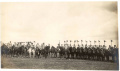 Император Николай II со Свитой верхом объезжает парадный строй эскадронов Лейб-гвардии Уланского Его Величества полка на Военном поле в Красном Селе. 