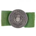Медаль (брошь для женщин) Императорского Финляндского Общества сельского хозяйства, на ленте зеленого цвета. 