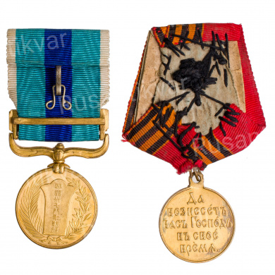 Две медали: российская "В память Русско - Японской войны 1904 - 1905 гг" и японская - "За участие в войне с Россией 1904 -1905 гг".