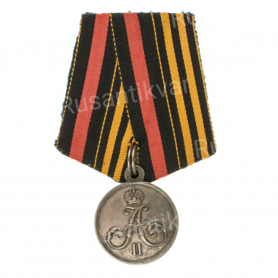 Медаль "За Хивинский поход 1873г" на колодке с совмещёнными лентами орденов Св. Георгия и Св. Владимира.