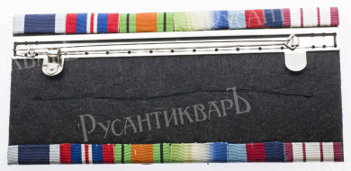 Великобритания. Наградная колодка из 6 медалей времен II мировой войны на имя V. A. Howard.