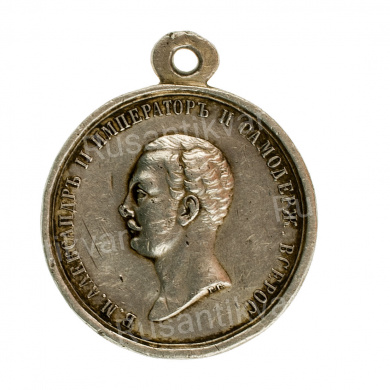 Медаль "За спасение погибавших" с портретом Императора Александра II (1855 - начало 1860 - х гг). Нагрудная, 29 мм (на обрезе портрета инициалы "РГ"). Серебро. 